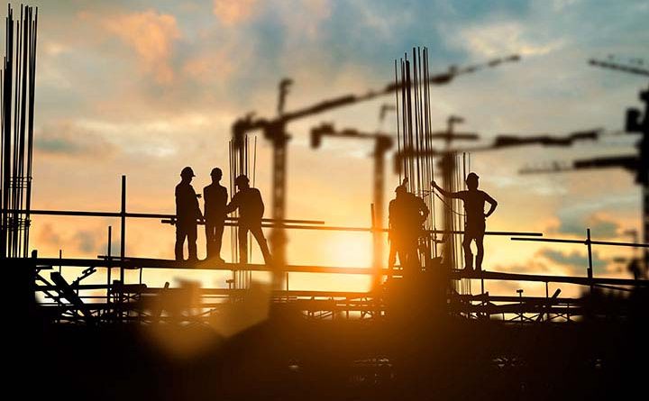 Building Tomorrow: Innovations in Multistory Construction; Silhouette of engineer and construction team working at site over blurred background for industry background with Light fair.Create from multiple reference images together
